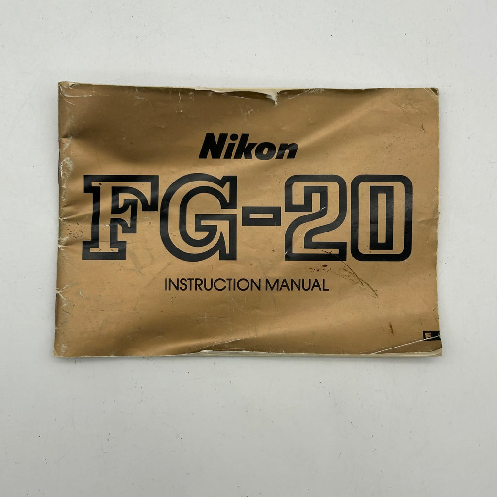 Nikon FG-20 35mm SLR Film Camera Bundle w/ 2 Lenses (Rokinon, Sigma) - Untested