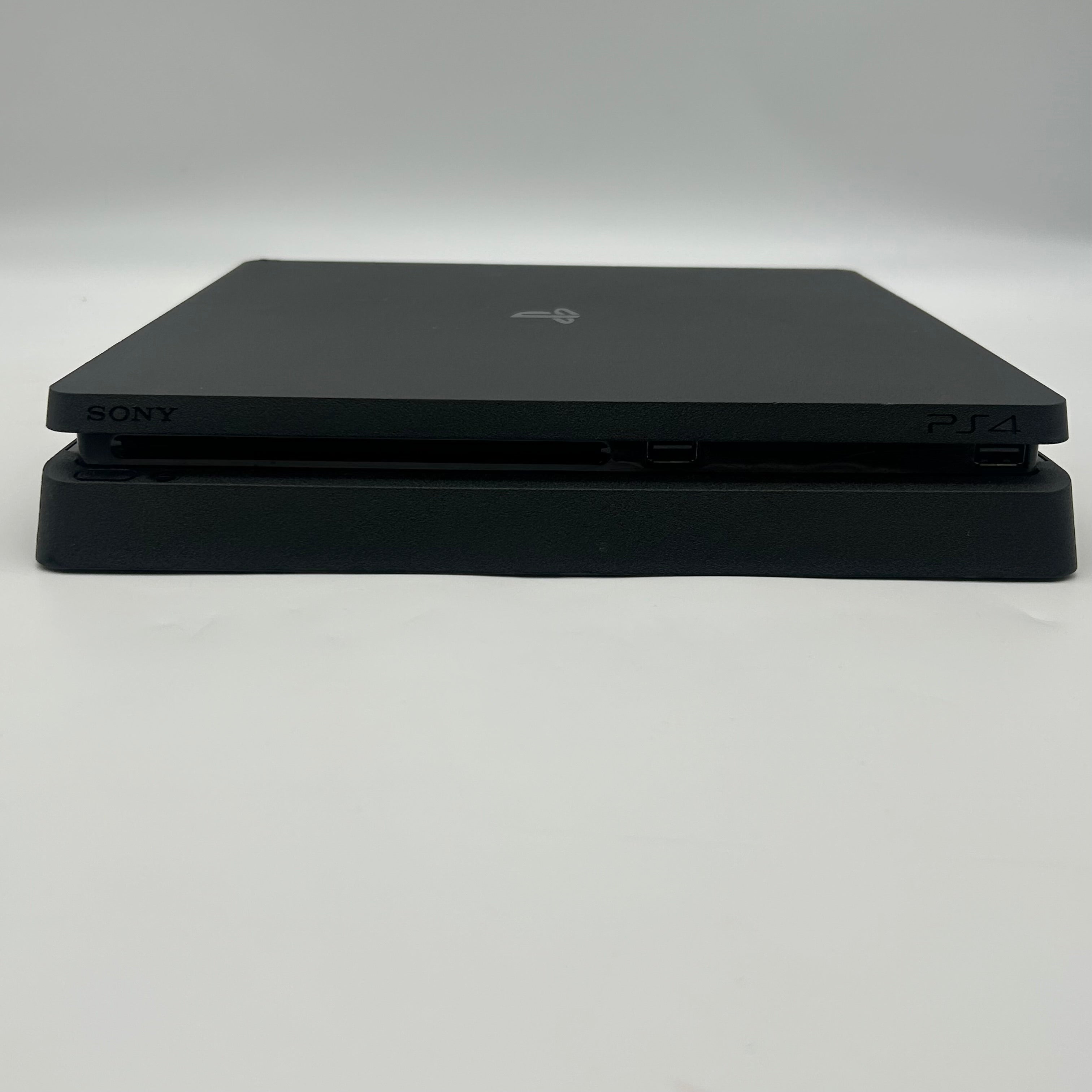 Sony PlayStation 4 Slim CUH-2215B 1TB Black w/ 1 Controller, Cables, 2 Games