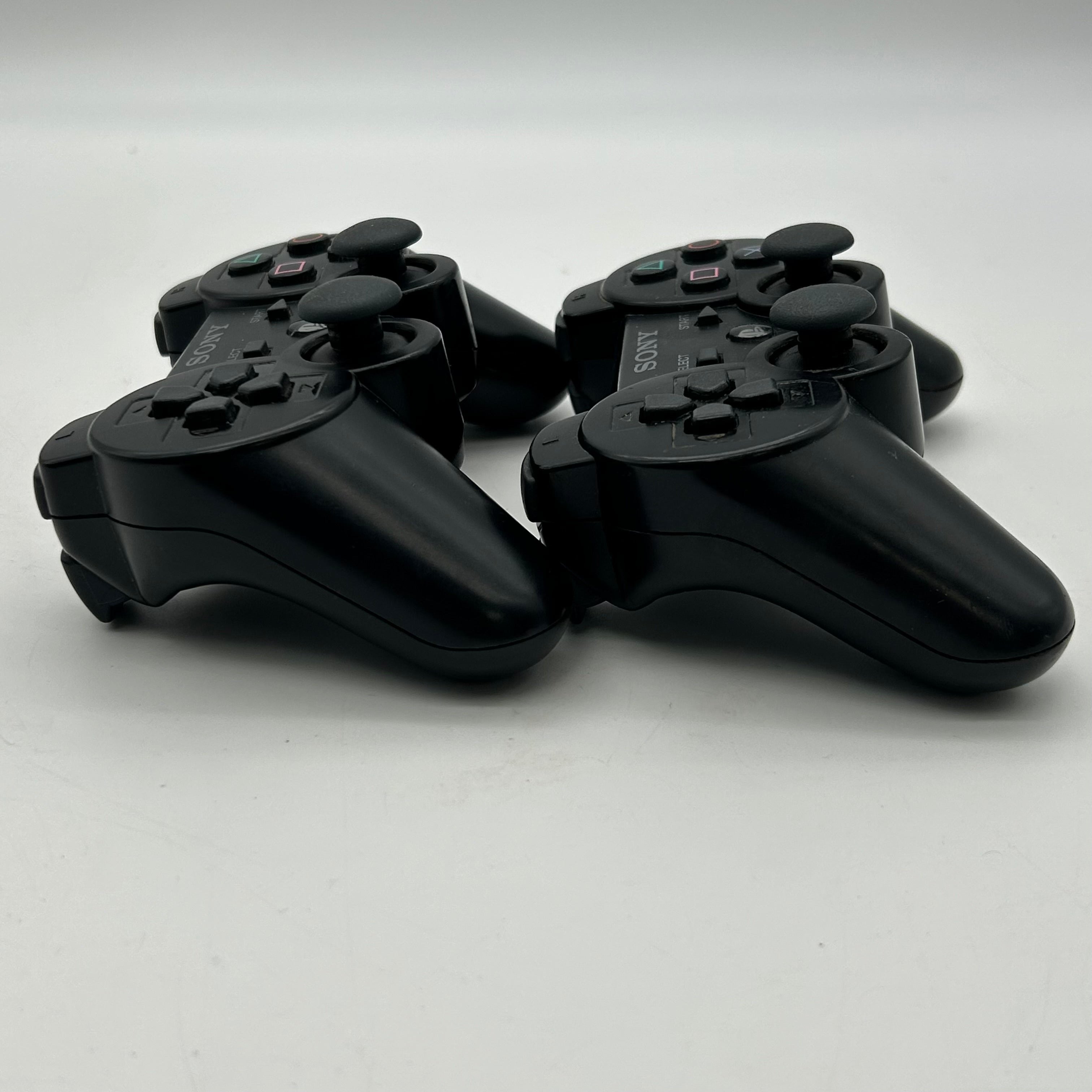 Sony PlayStation 3 Backward Compatible (CECHA01) 500GB Bundle:2 Controllers & 4 Games