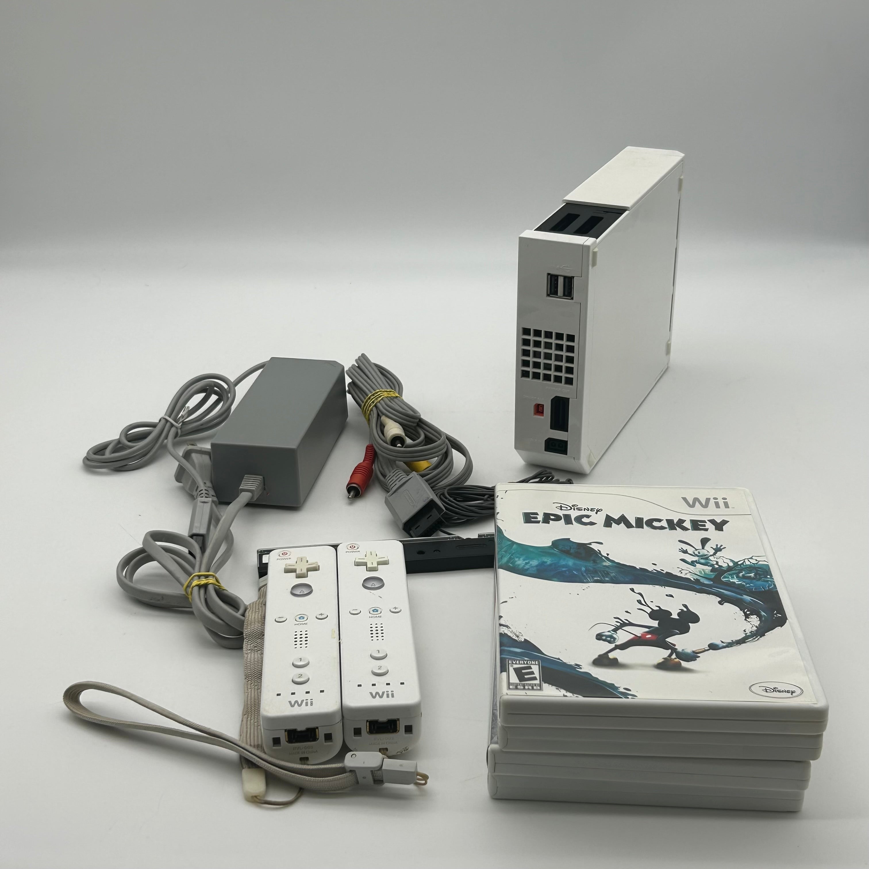 Nintendo Wii RVL-001 Home Console Bundle With 2 Controllers, 4 Games, and Cables