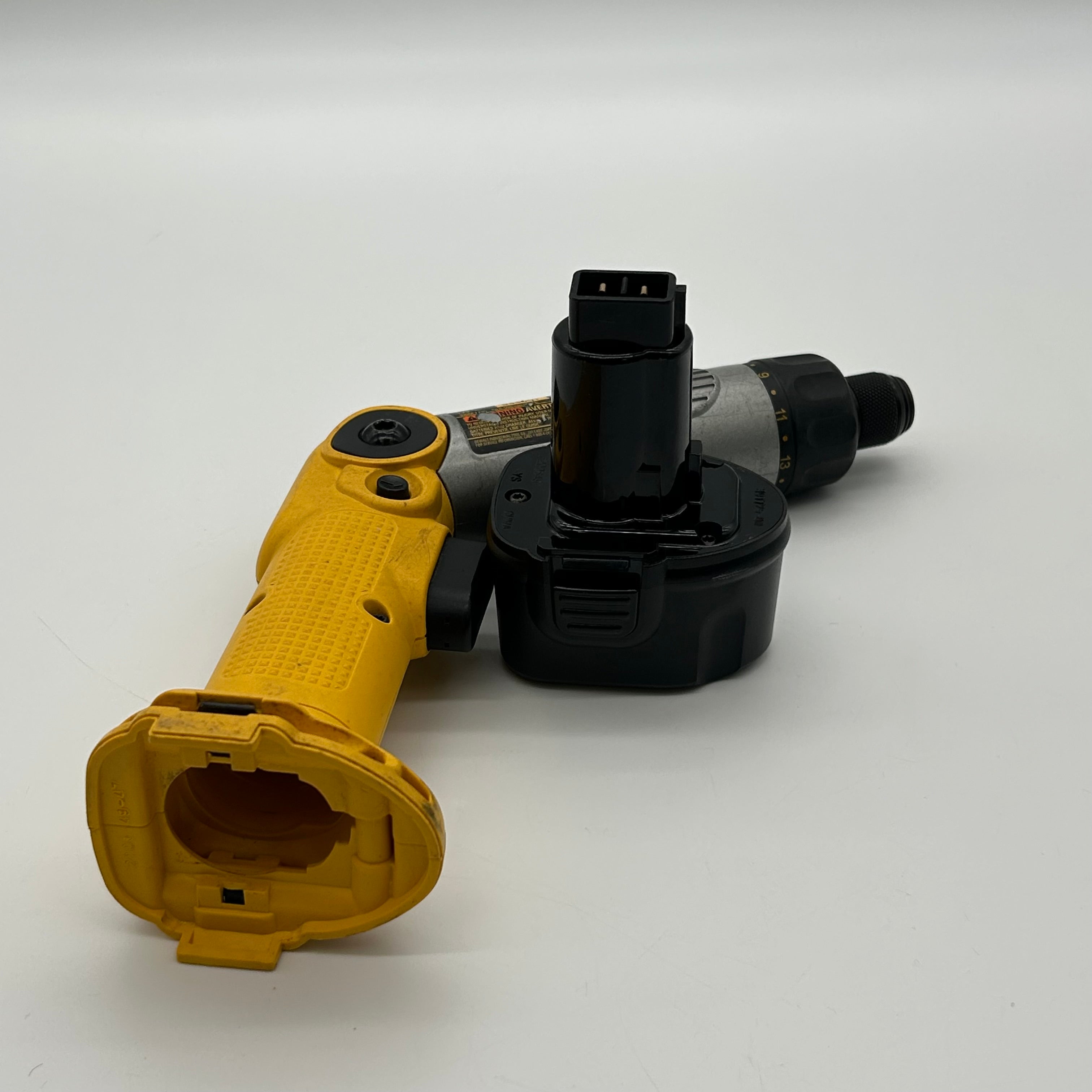 DeWalt DW920 Power Tool, Battery, battery charger, and 2 bits
