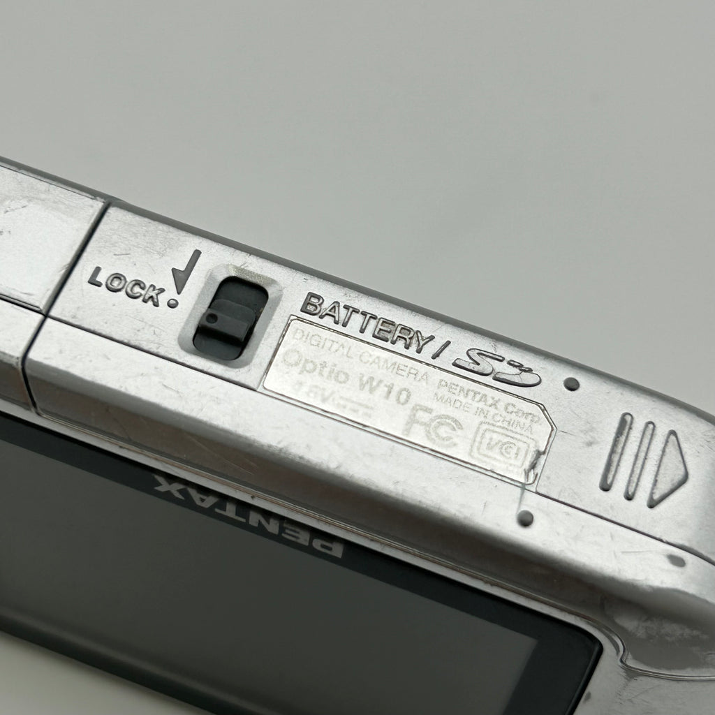 Pentax Underwater Digital Camera Optio W10 6.0MP Silver Tested & Includes 64GB SDXC Card - Used