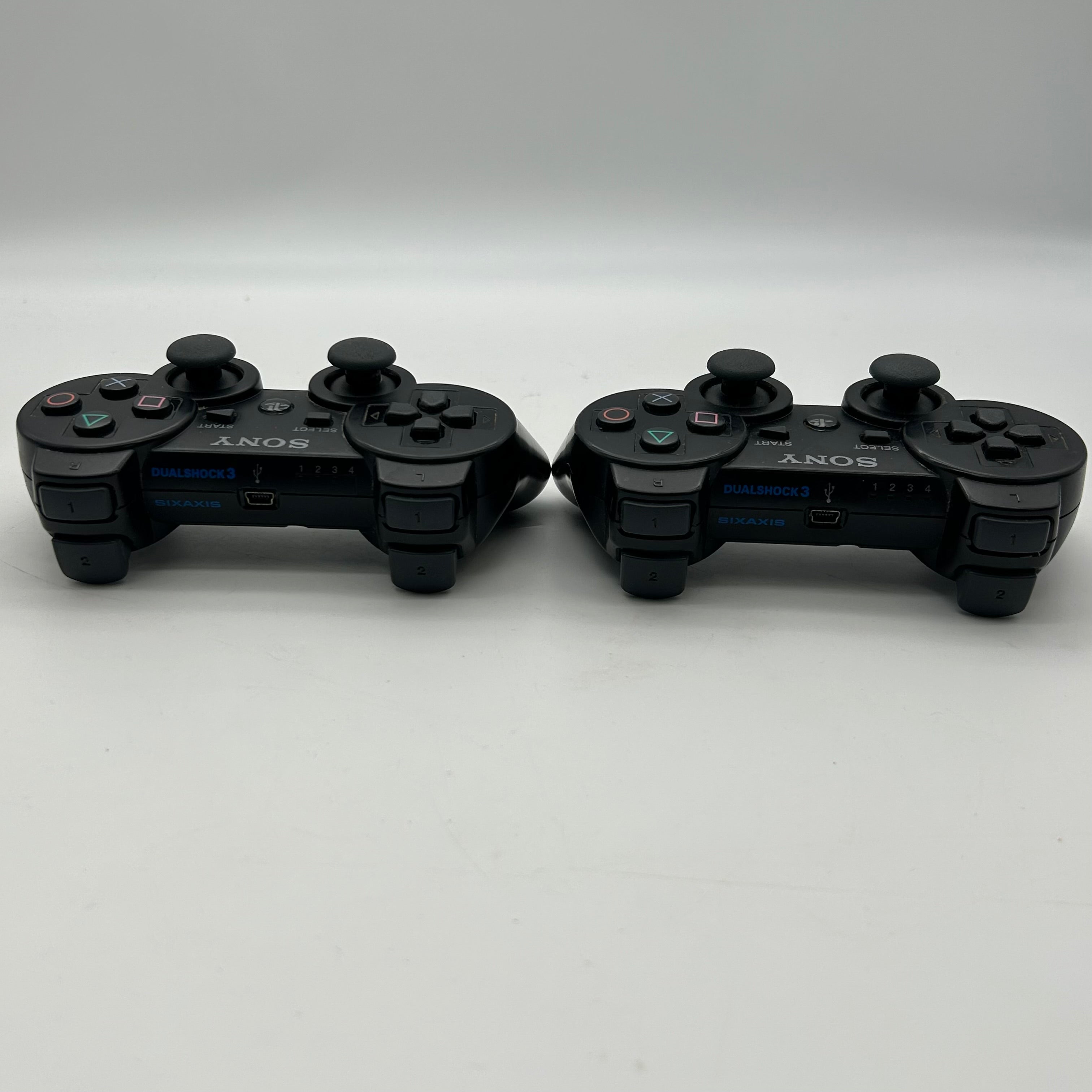Sony PlayStation 3 Backward Compatible (CECHA01) 500GB Bundle:2 Controllers & 4 Games