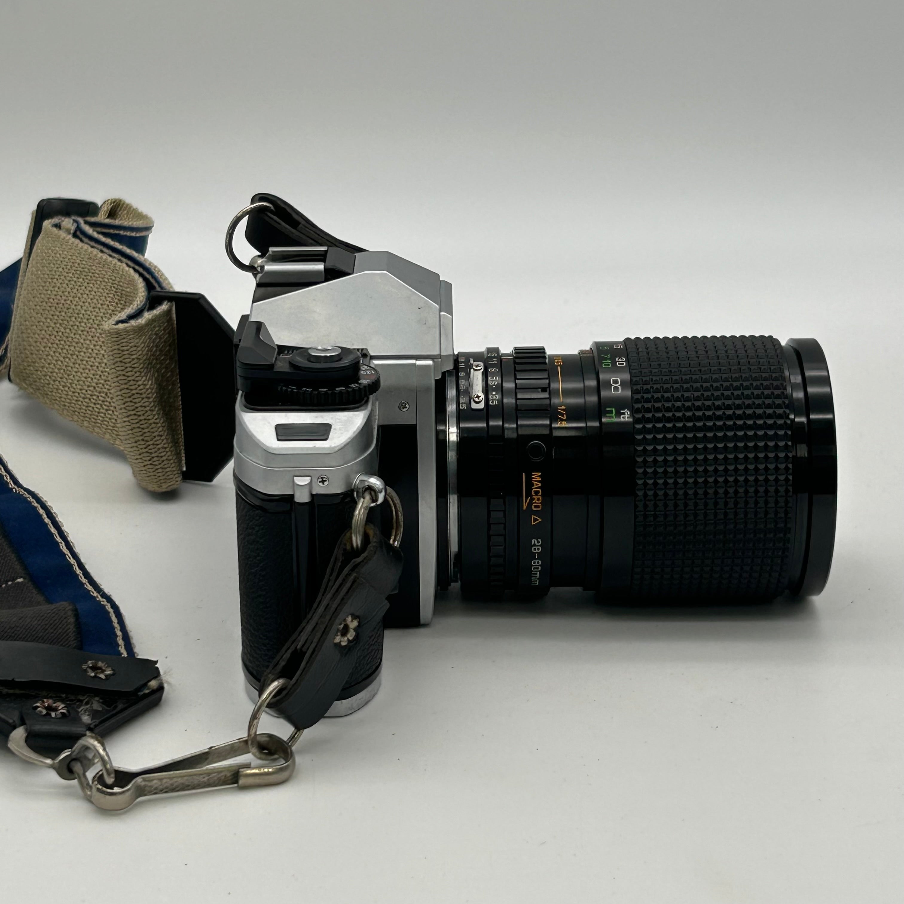 Nikon FG-20 35mm SLR Film Camera Bundle w/ 2 Lenses (Rokinon, Sigma) - Untested