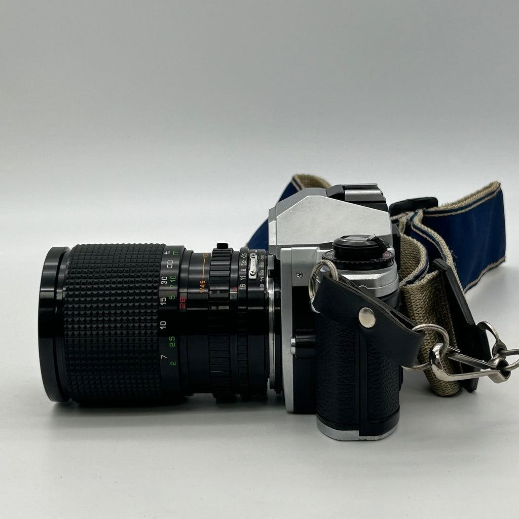 Nikon FG-20 35mm SLR Film Camera Bundle w/ 2 Lenses (Rokinon, Sigma) - Untested