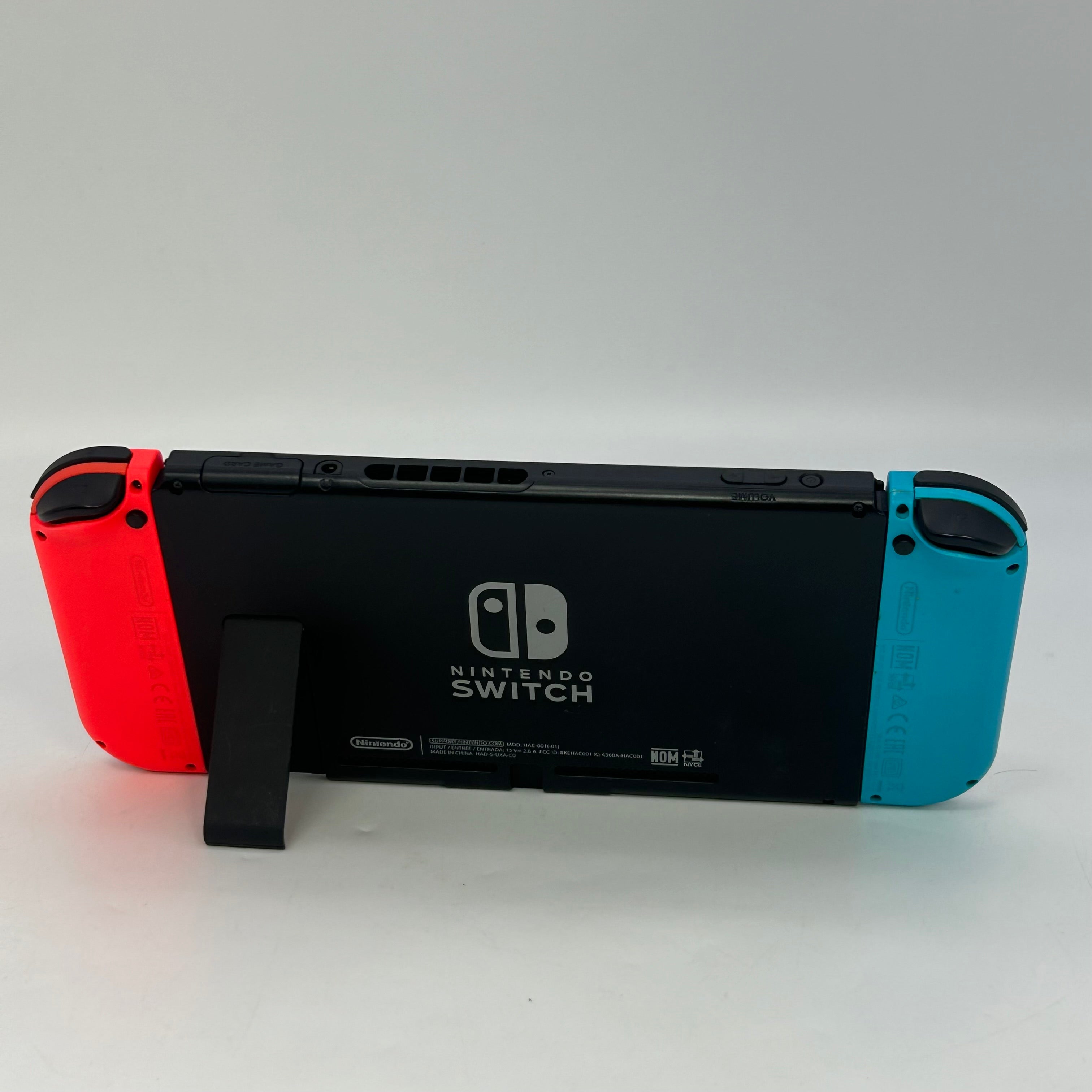 Nintendo Switch HAC-001-01 2019 Black 32GB Console with Joy-Cons, Power Cable, and Included Games