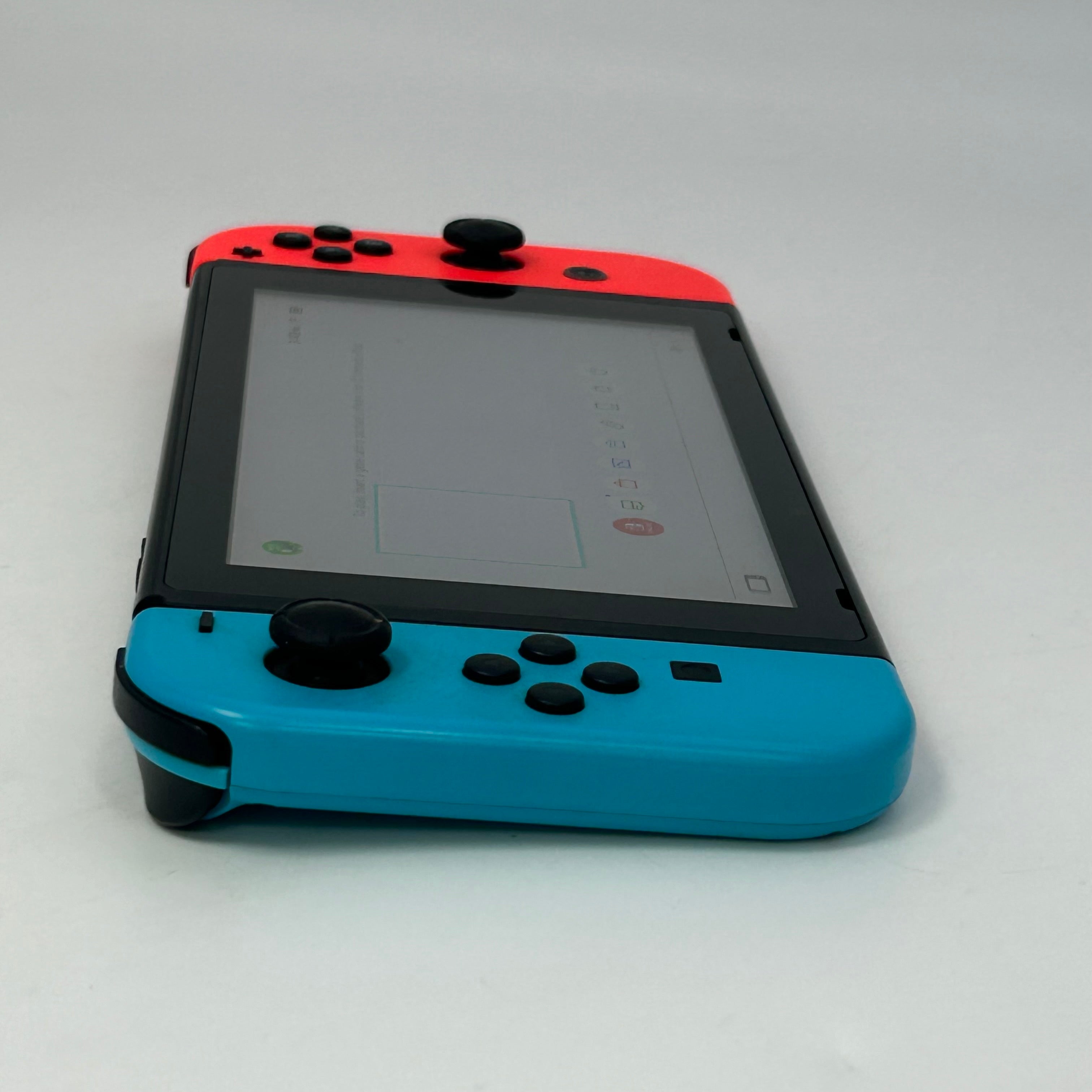 Nintendo Switch HAC-001-01 2019 Black 32GB Console with Joy-Cons, Power Cable, and Included Games