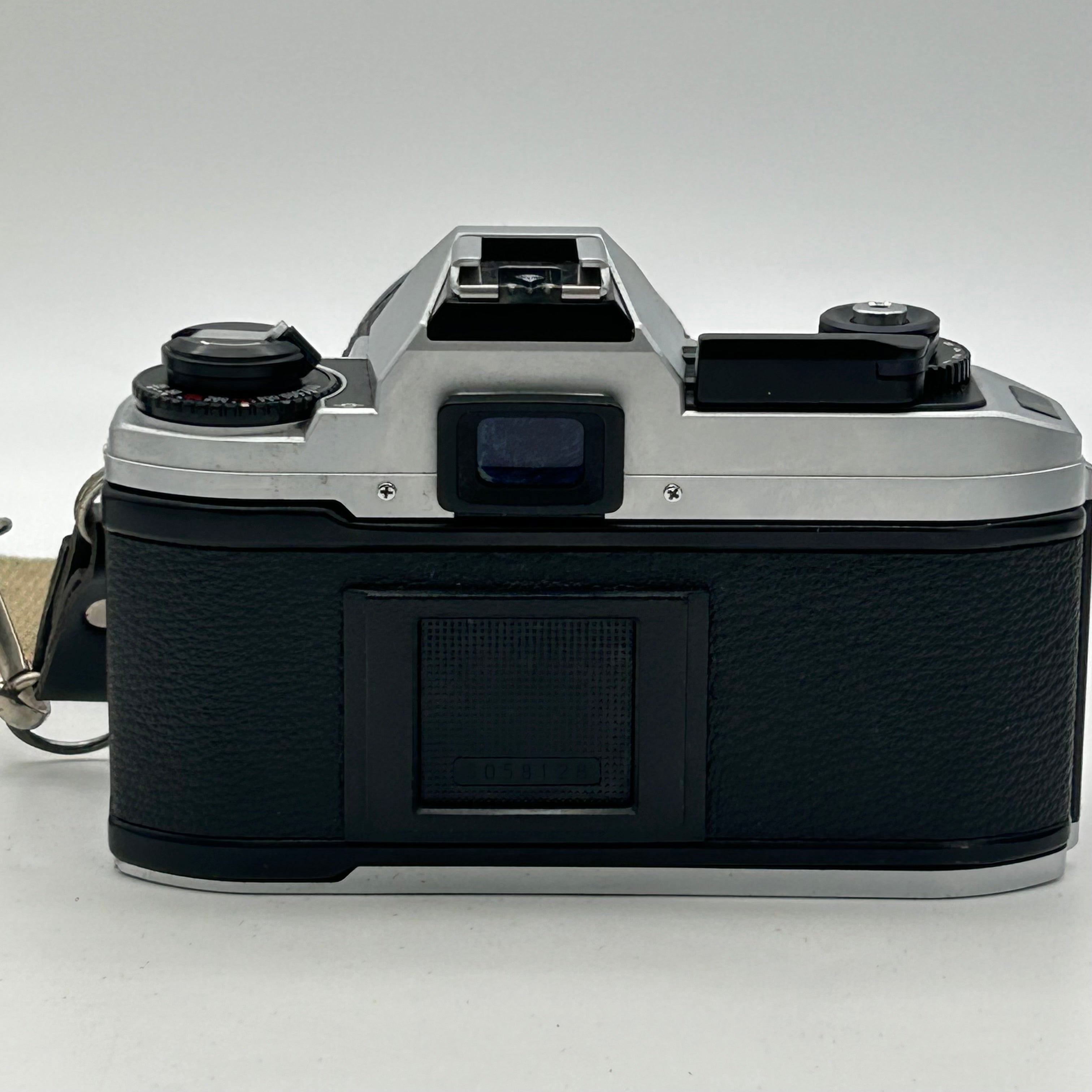 Nikon FG-20 35mm SLR Film Camera Bundle w/ 2 Lenses (Rokinon, Sigma) - Untested