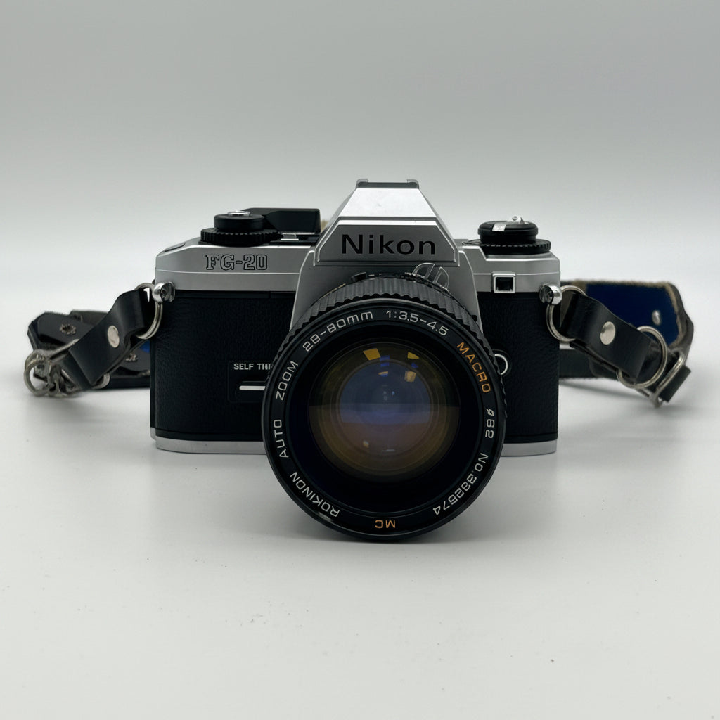 Nikon FG-20 35mm SLR Film Camera Bundle w/ 2 Lenses (Rokinon, Sigma) - Untested