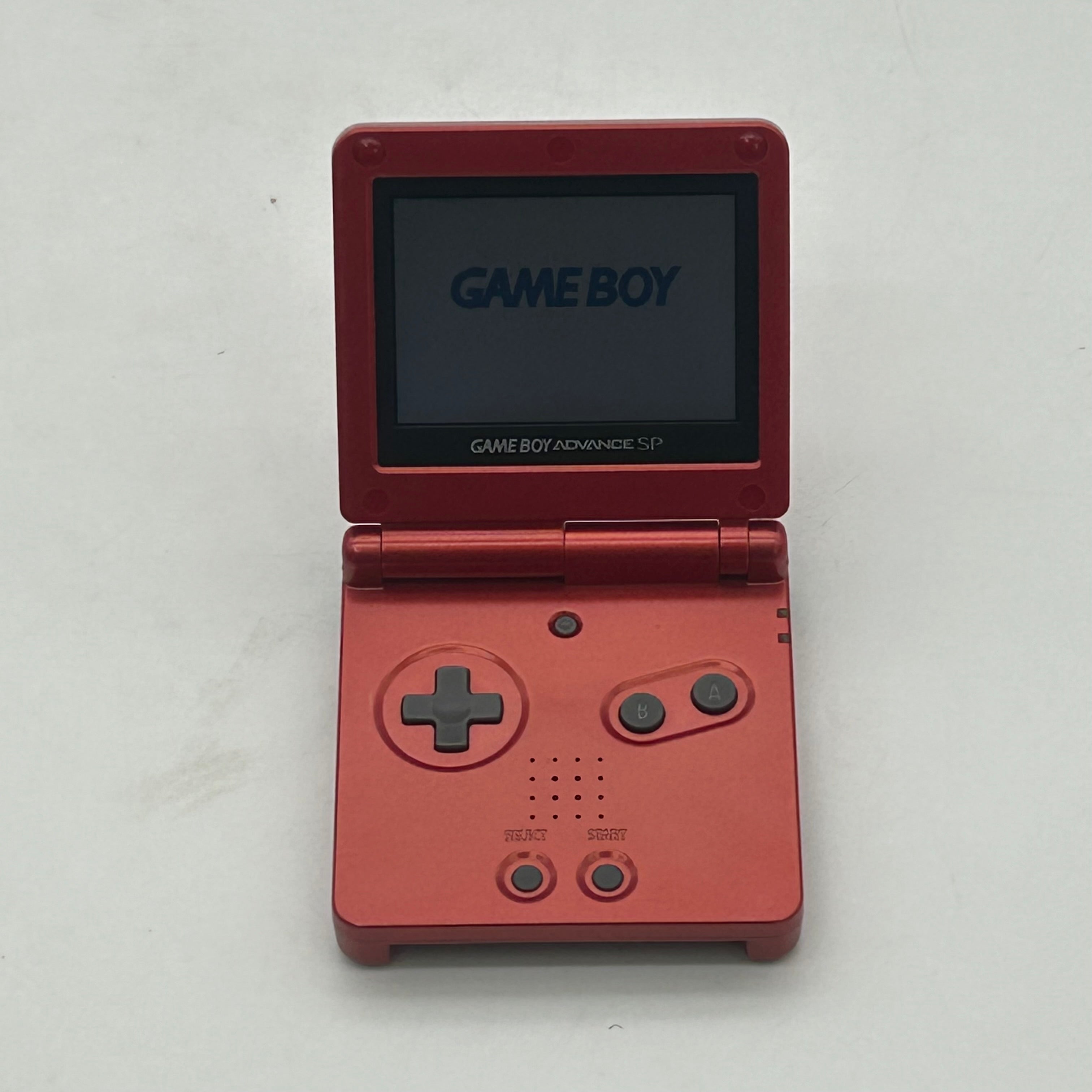 Nintendo Game Boy Advance SP (AGS-001) w/ Charger and 4 games - Tested