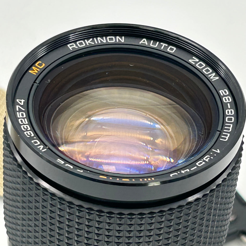 Nikon FG-20 35mm SLR Film Camera Bundle w/ 2 Lenses (Rokinon, Sigma) - Untested