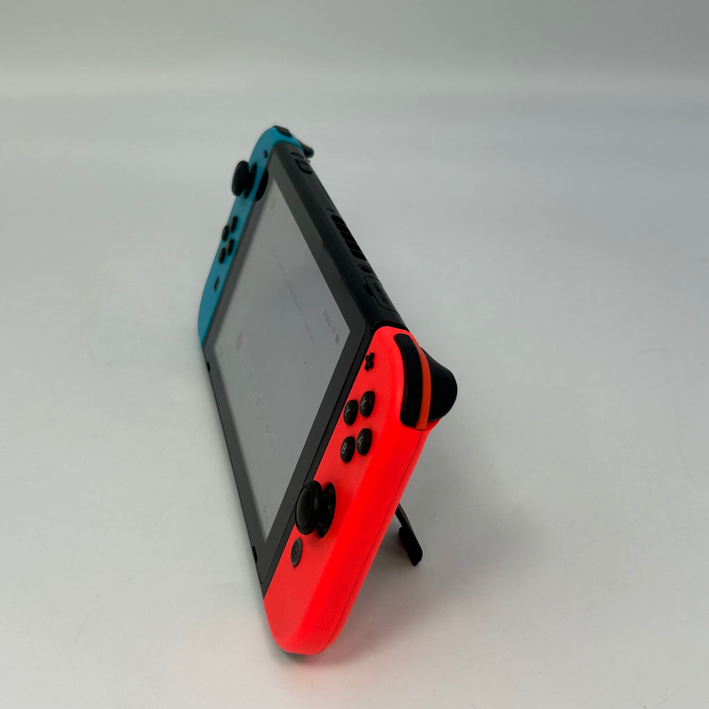 Nintendo Switch HAC-001-01 2019 Black 32GB Console with Joy-Cons, Power Cable, and Included Games