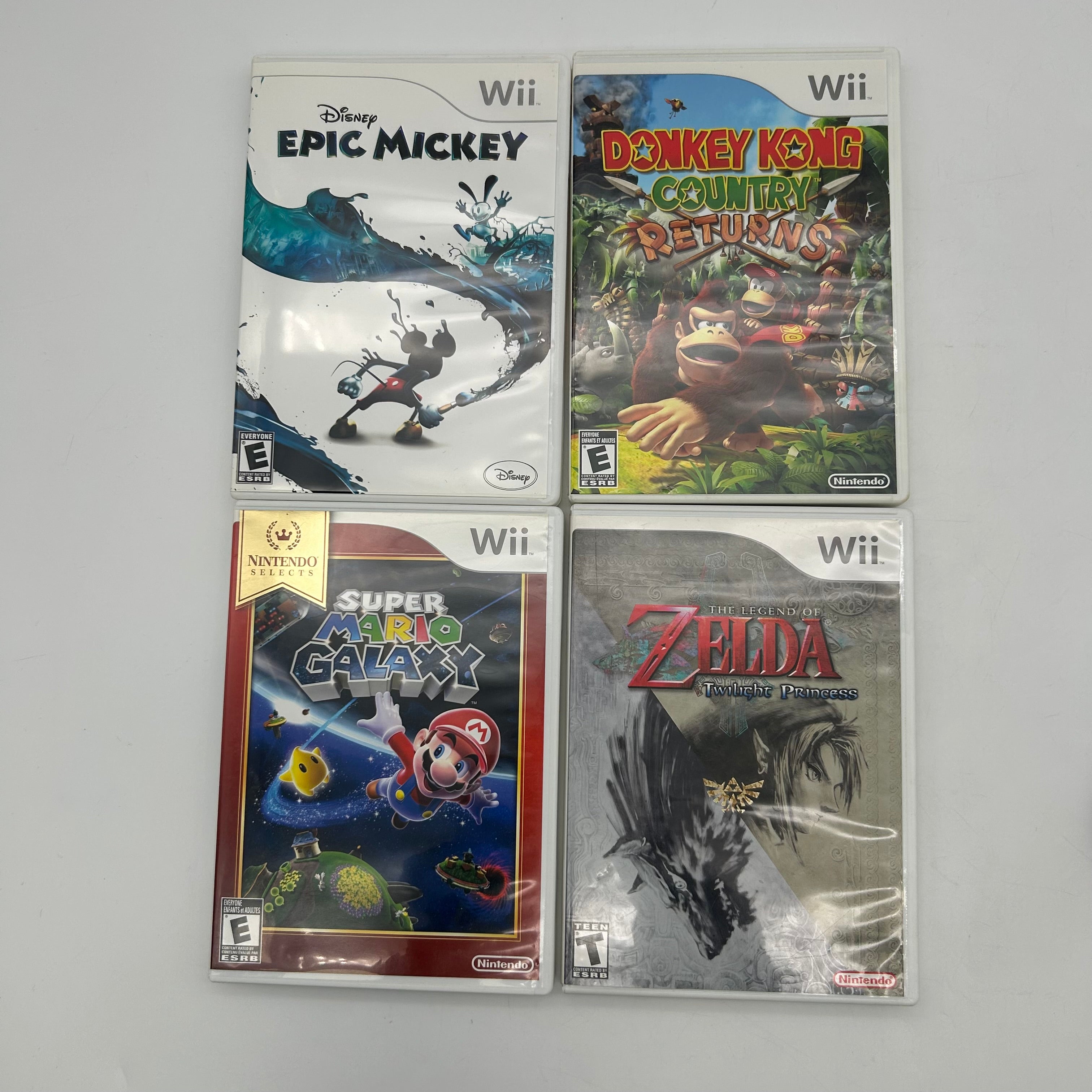 Nintendo Wii RVL-001 Home Console Bundle With 2 Controllers, 4 Games, and Cables