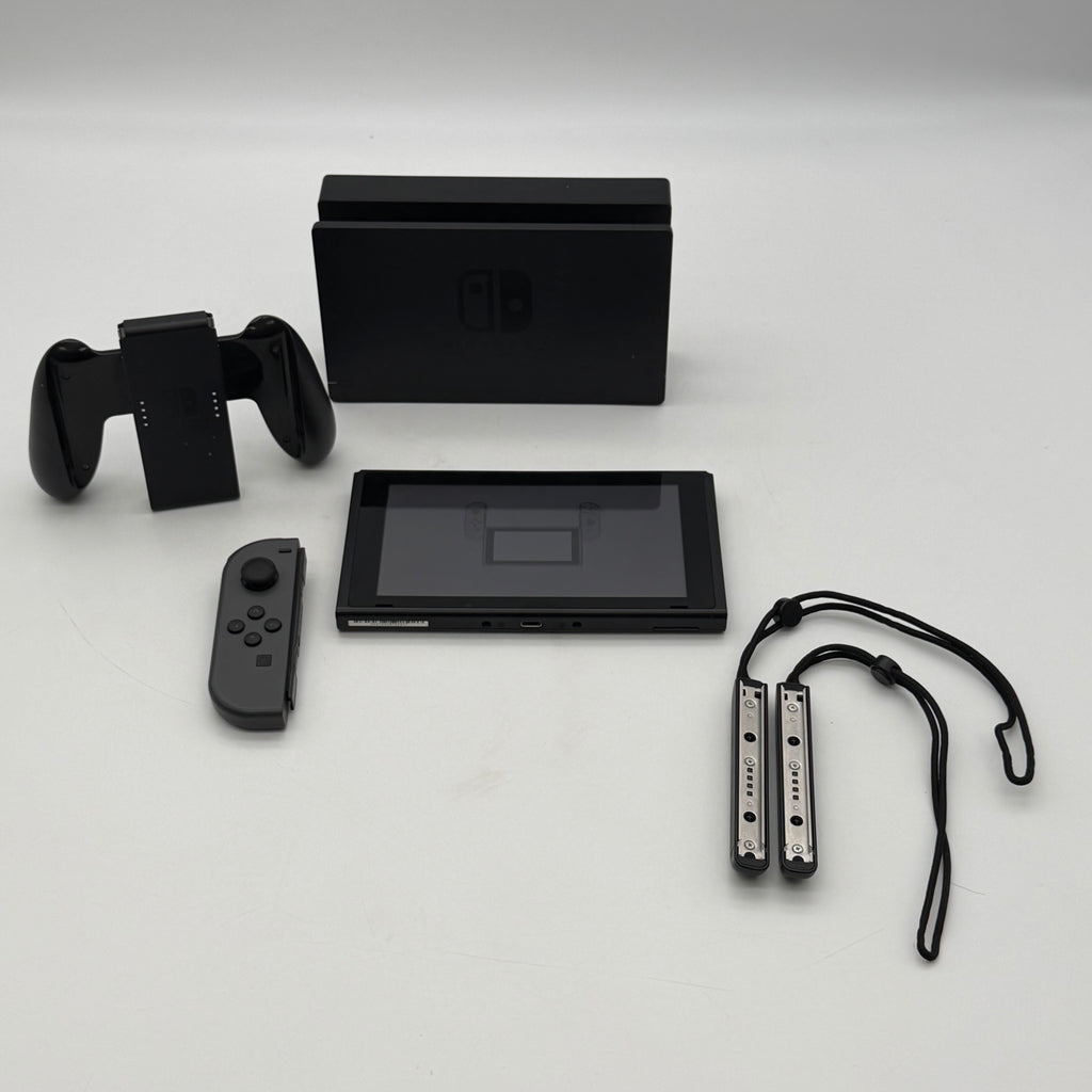 Nintendo Switch 2019 HAC-001-01 Black 64GB Console Bundled - One Joy-Con Controller, Dock, Joy Con Holder