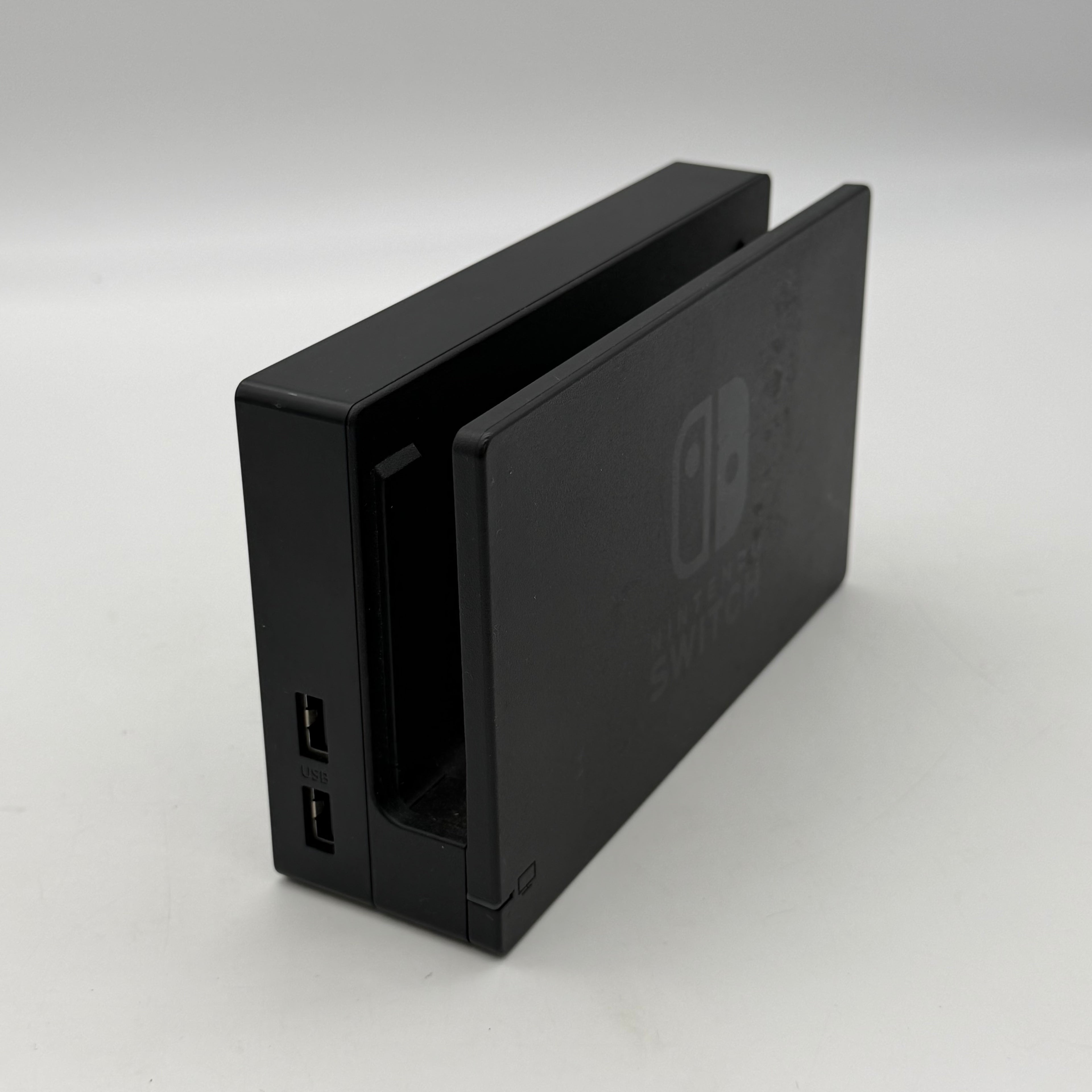 Nintendo Switch 2019 HAC-001-01 Black 64GB Console Bundled - One Joy-Con Controller, Dock, Joy Con Holder