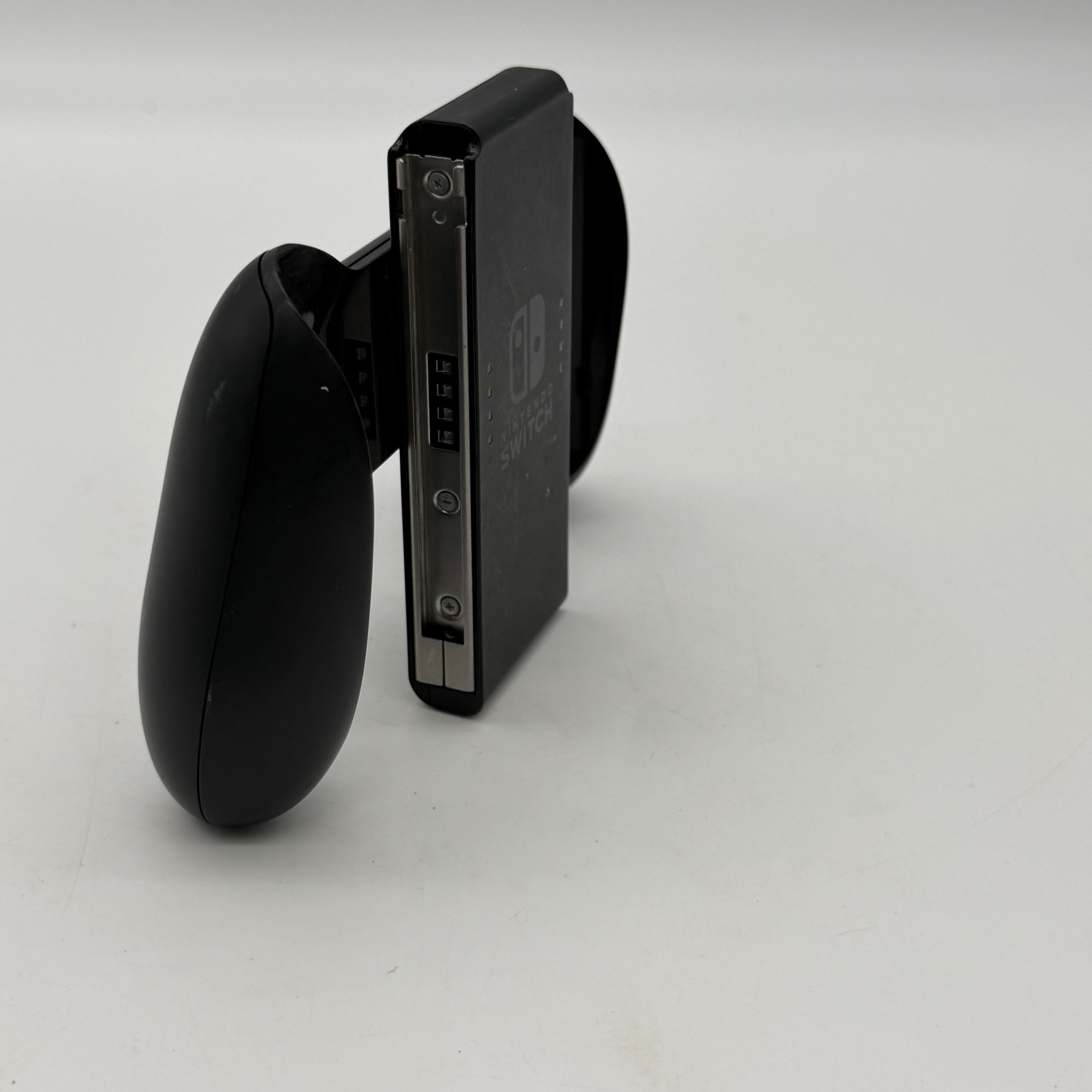 Nintendo Switch 2019 HAC-001-01 Black 64GB Console Bundled - One Joy-Con Controller, Dock, Joy Con Holder