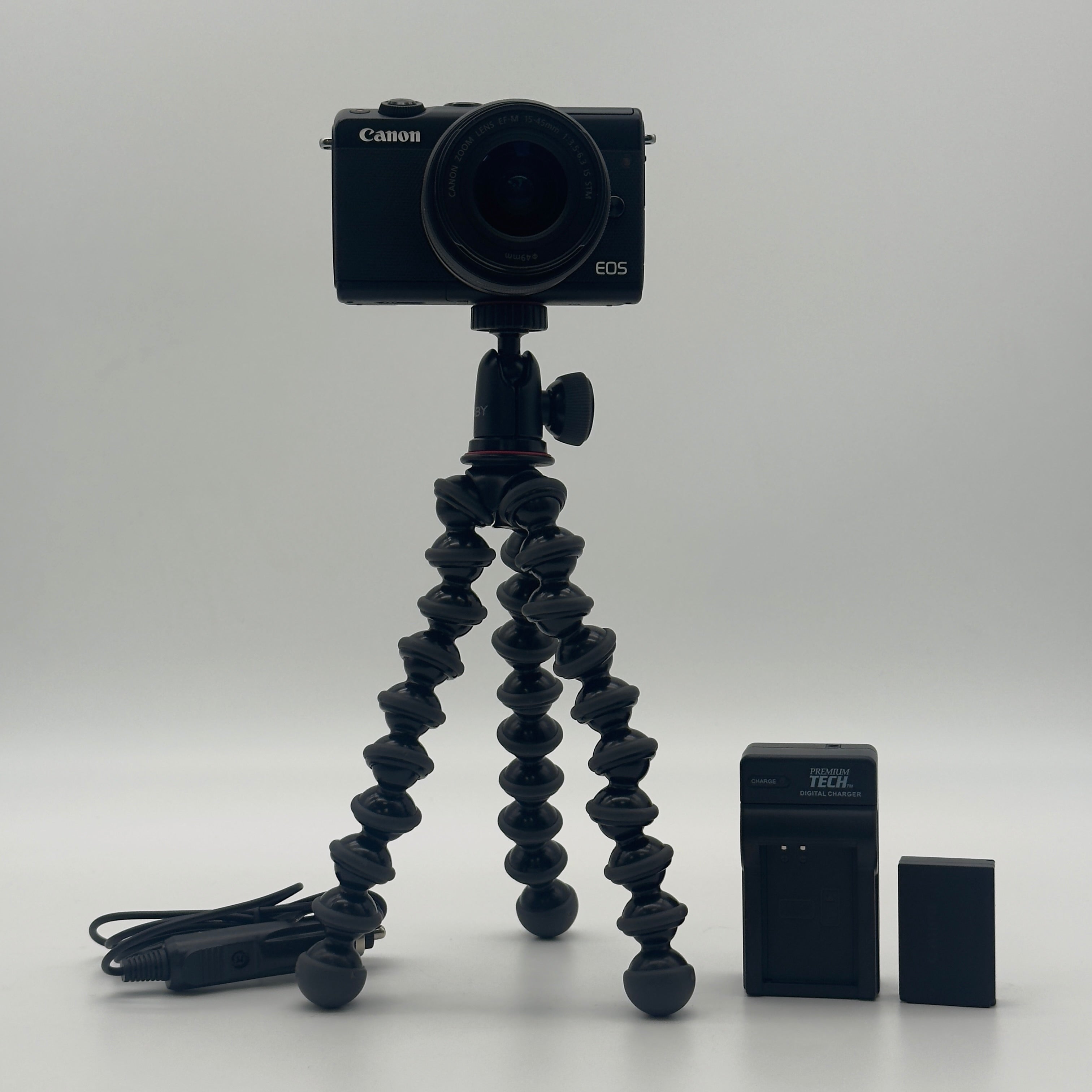 Canon EOS M100 24.2MP Digital Camera (EF-M IS STM 15-45mm) with Tripod