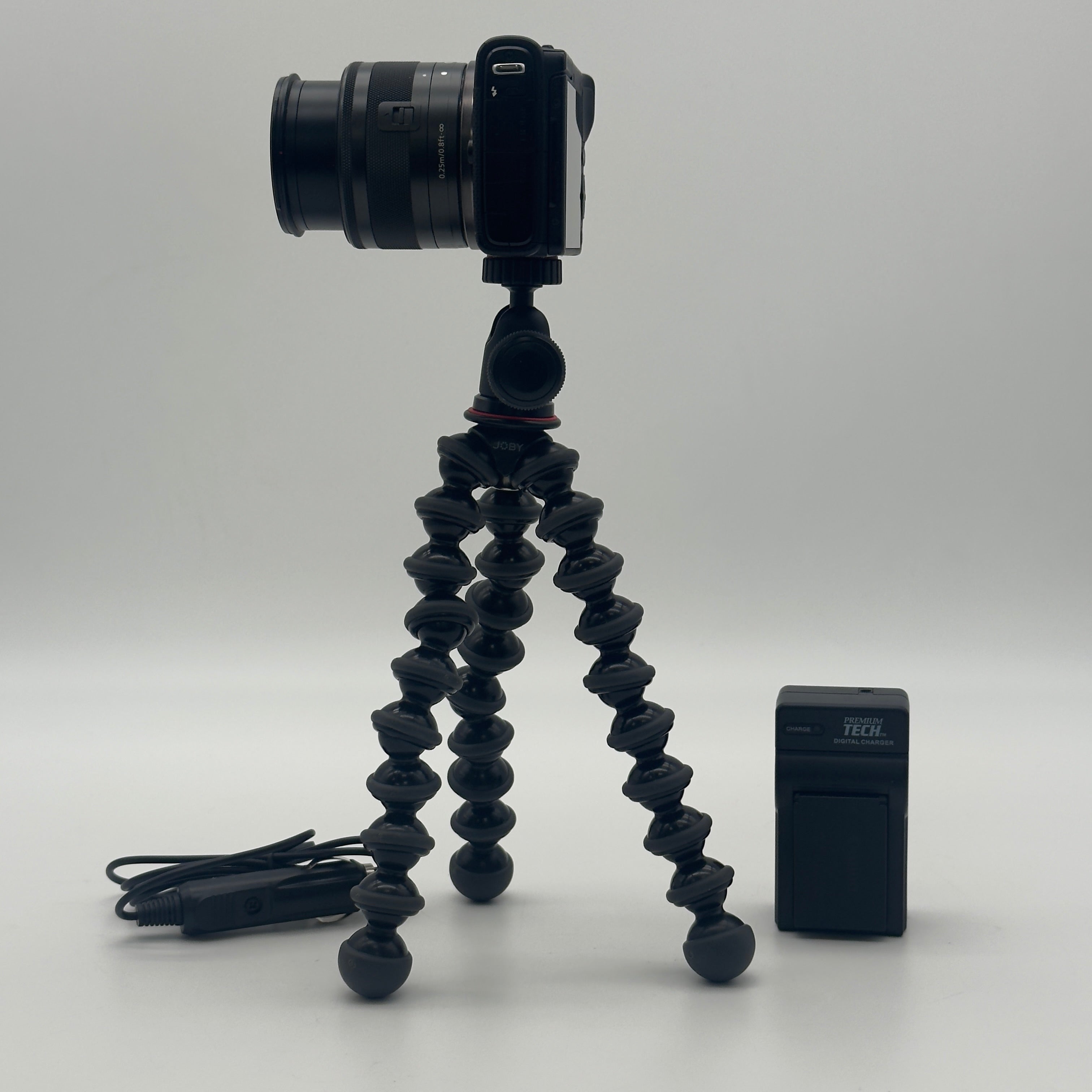 Canon EOS M100 24.2MP Digital Camera (EF-M IS STM 15-45mm) with Tripod