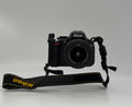 Nikon D5100 16.2MP Digital SLR Camera w/ AF-S VR 18-55mm and Bag