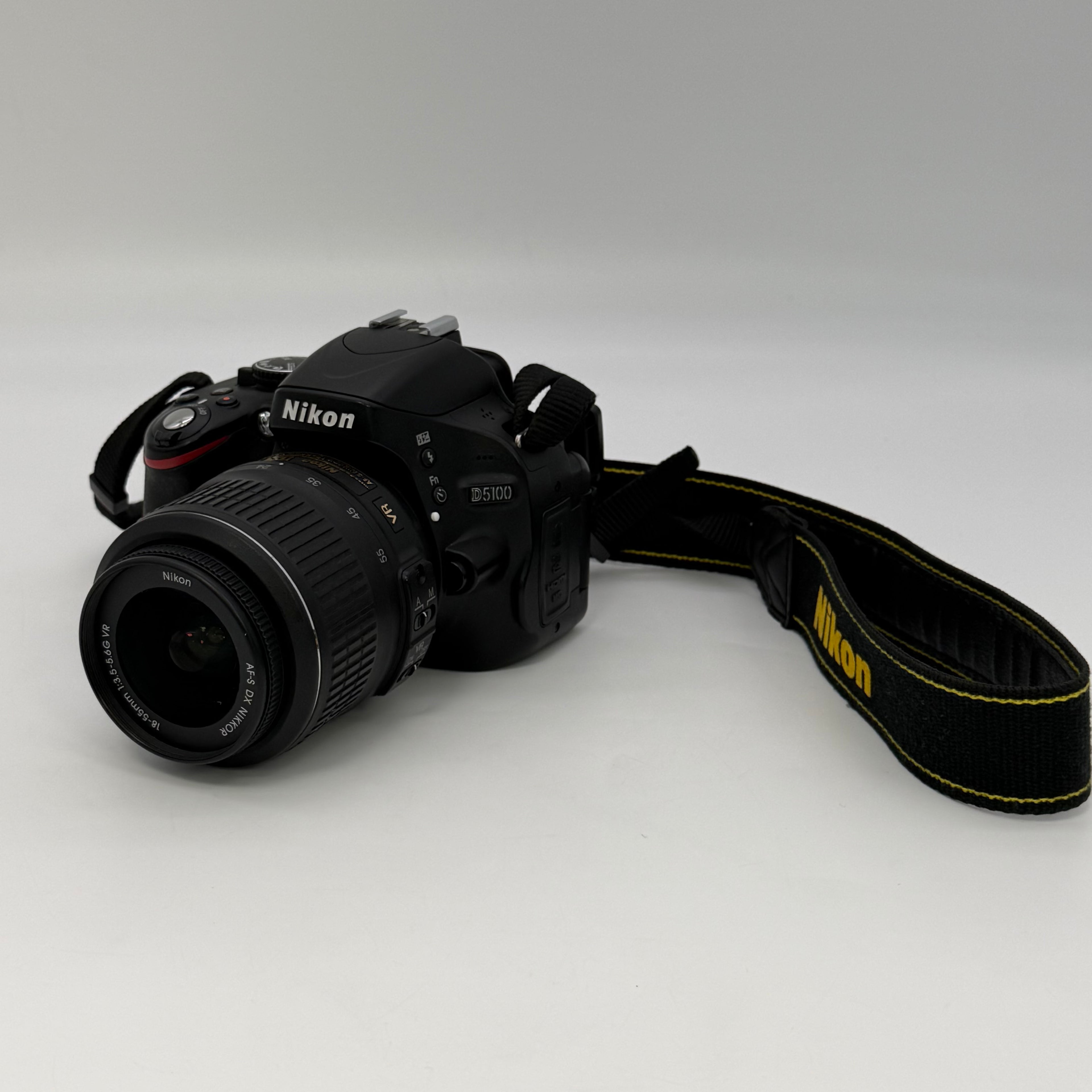 Nikon D5100 16.2MP Digital SLR Camera w/ AF-S VR 18-55mm and Bag
