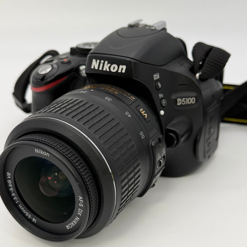 Nikon D5100 16.2MP Digital SLR Camera w/ AF-S VR 18-55mm and Bag