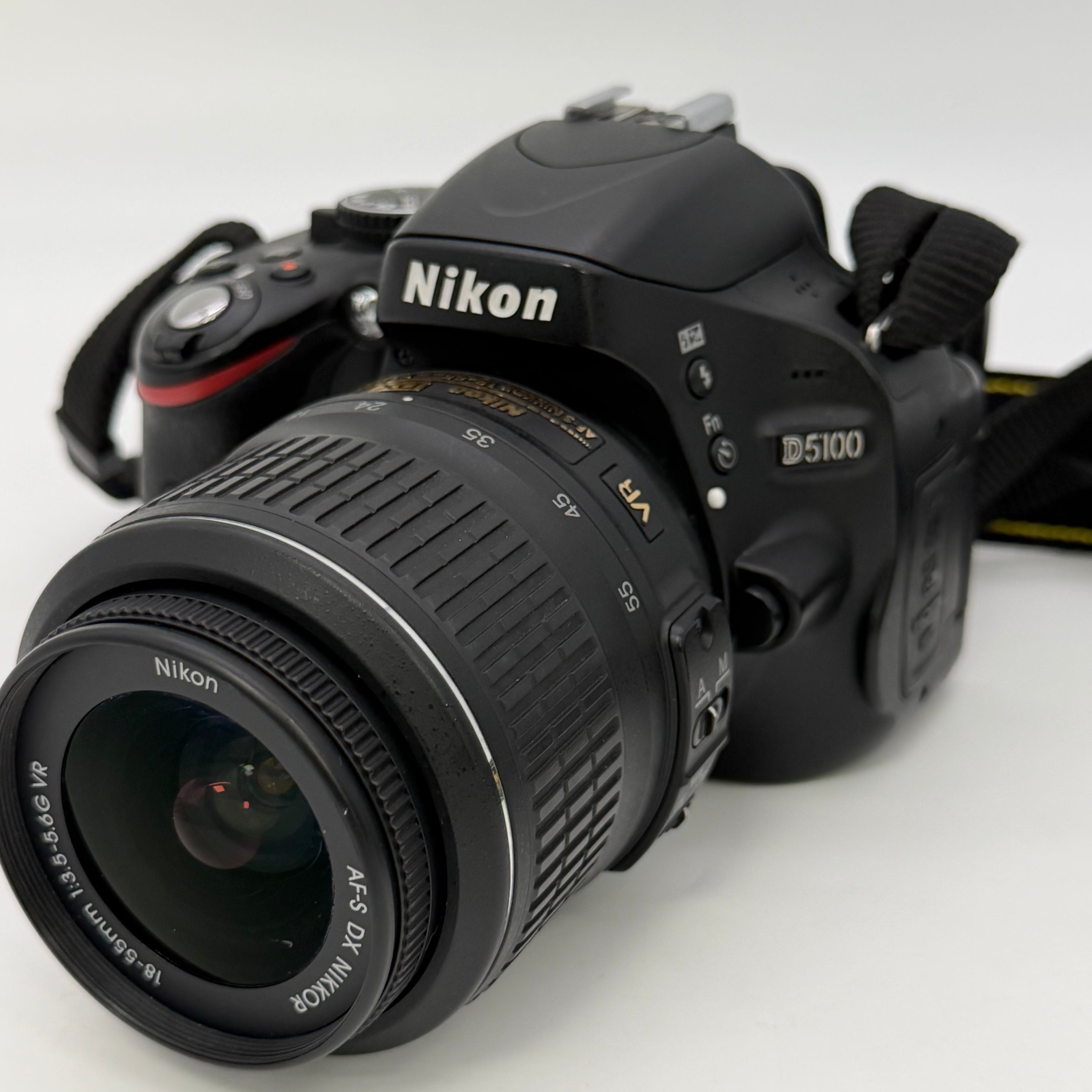 Nikon D5100 16.2MP Digital SLR Camera w/ AF-S VR 18-55mm and Bag