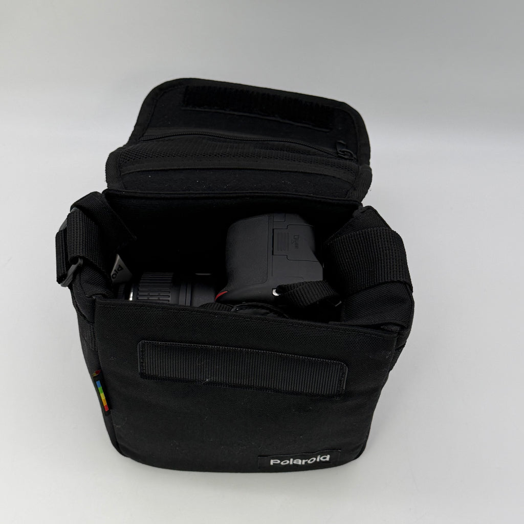Nikon D5100 16.2MP Digital SLR Camera w/ AF-S VR 18-55mm and Bag