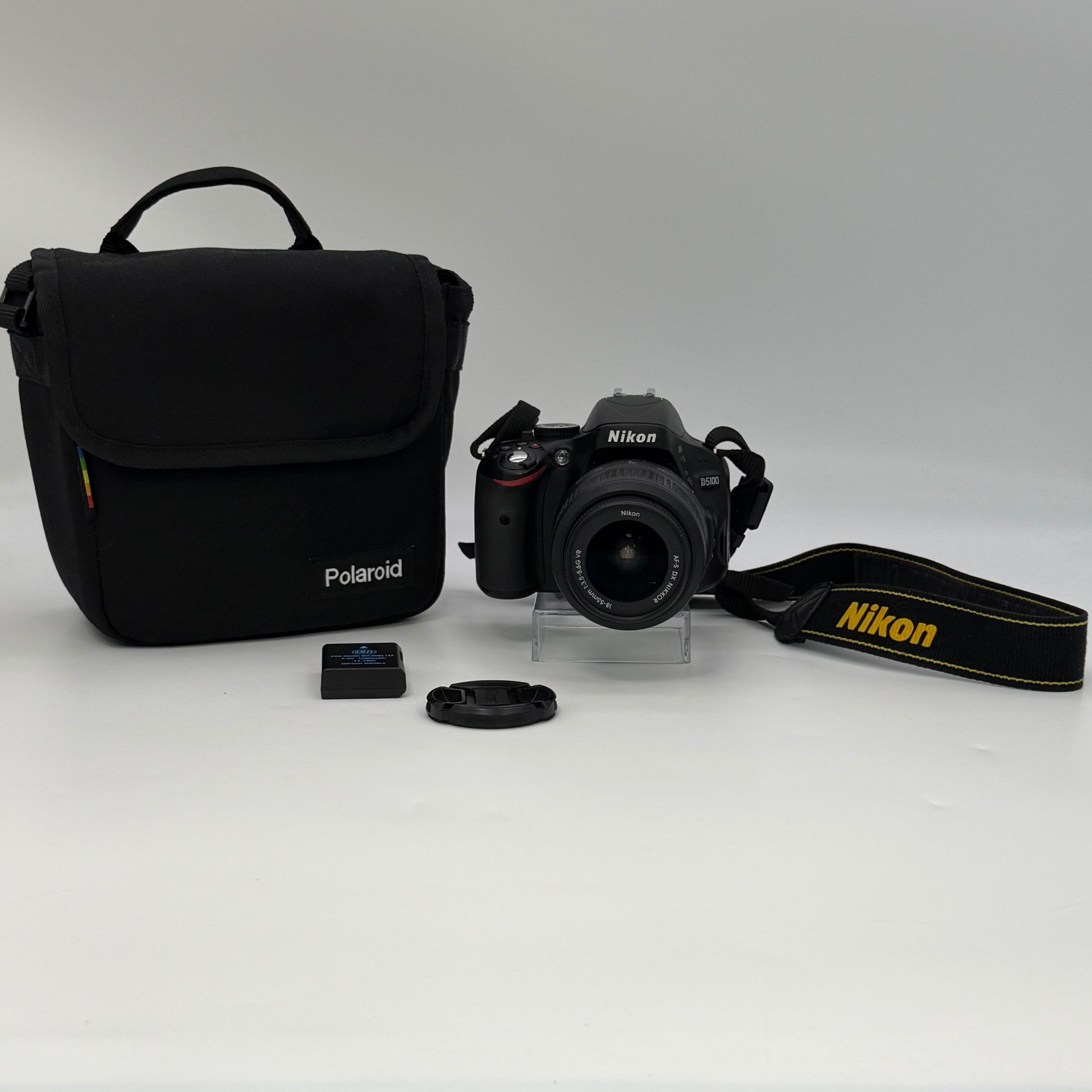 Nikon D5100 16.2MP Digital SLR Camera w/ AF-S VR 18-55mm and Bag